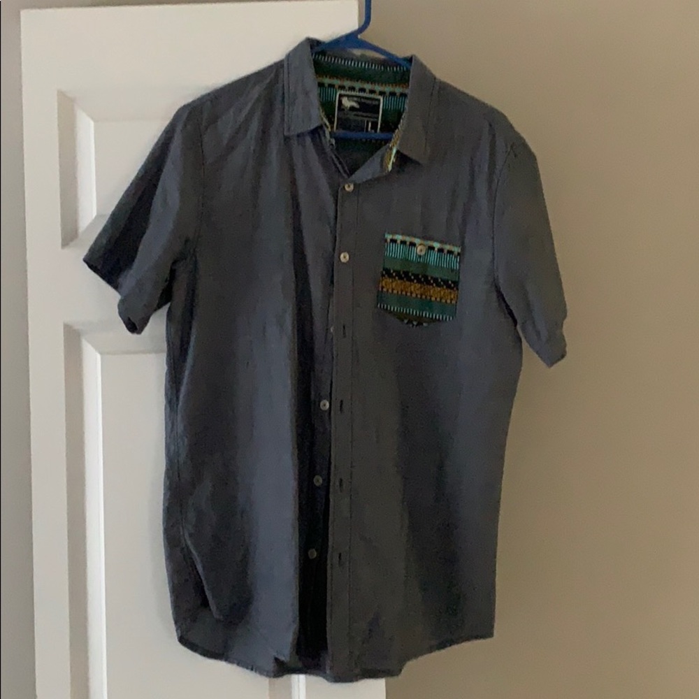 Blue short sleeve button-up.